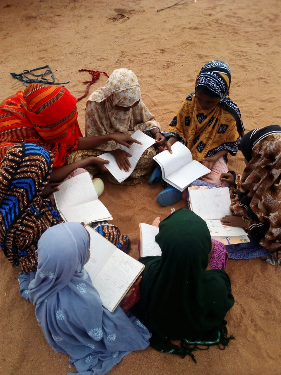 Adolescent girls in a safe-space mentoring session