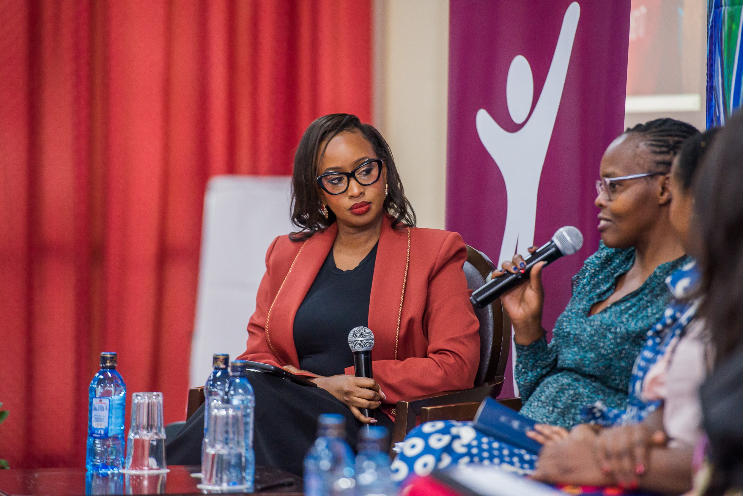 Young feminist advocates in a community meeting